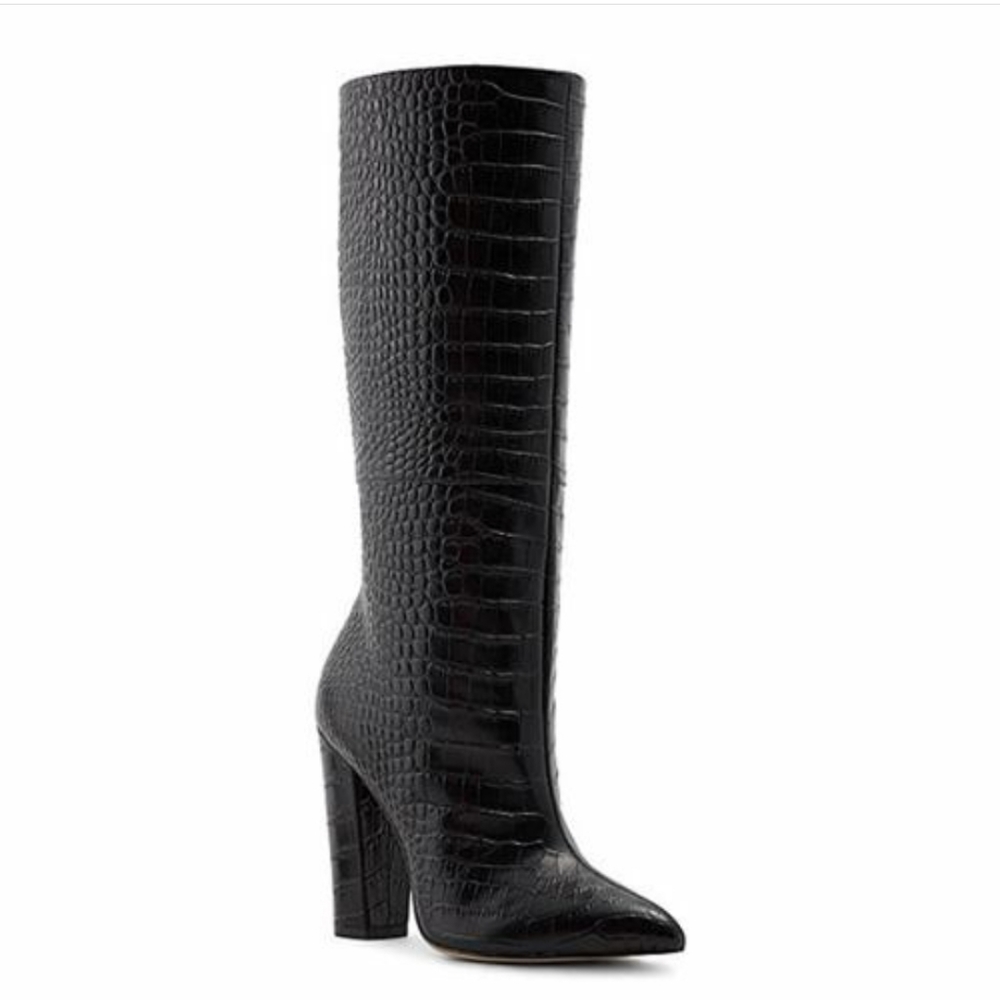 Black knee high boots crocodile pattern.